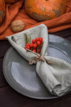 Fall themed holiday table setting arrangement for a seasonal party Stock Photos