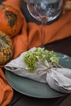 Fall themed holiday table setting arrangement for a seasonal party Stock Photos