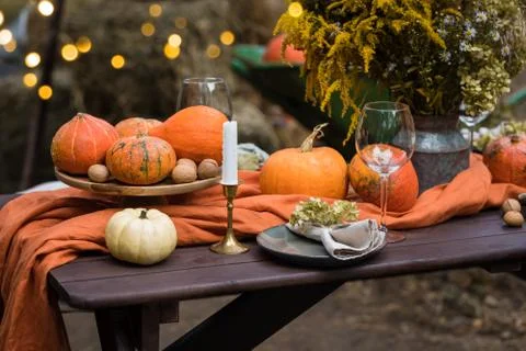 Fall themed holiday table setting arrangement for a seasonal party Stock Photos