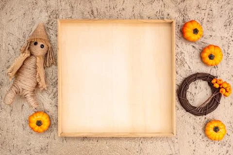 Fall wooden frame with copyspace and pumpkin Stock Photos