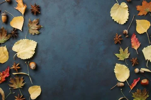Fall yellow leaves frame on dark surface, editable Stock Photos