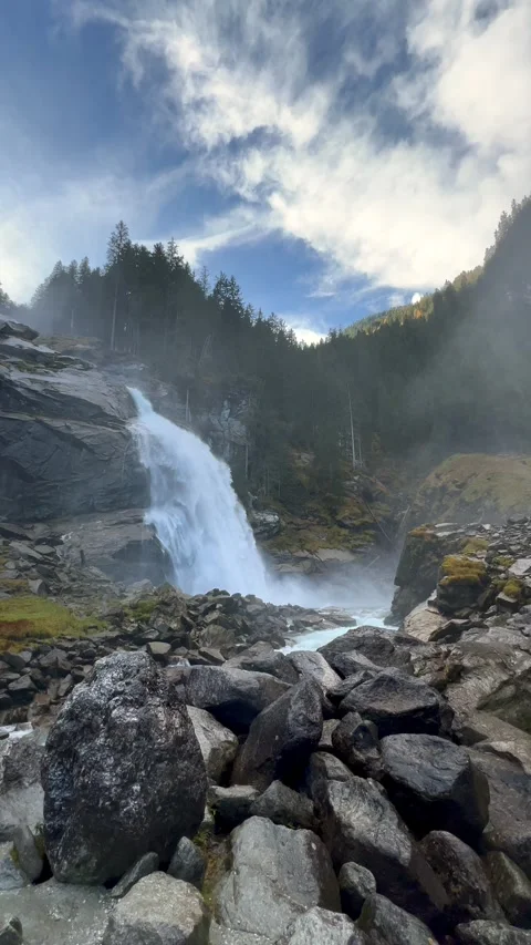 Fallbach mountain waterfall pouring over dark rock. Autumn in Austria. Video stock 346911884