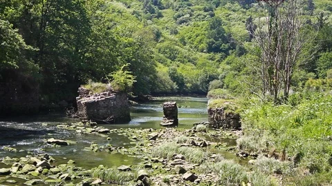 Fallen bridge at river Stock Footage 94554532