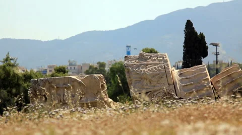 Fallen columns in the Temple of Olympian Zeus in Athens, Greece Stock Footage 64410662