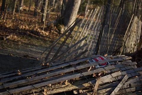 Fallen down fence 스톡 사진