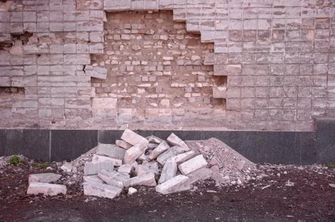 Fallen old brick wall. Stock Photos