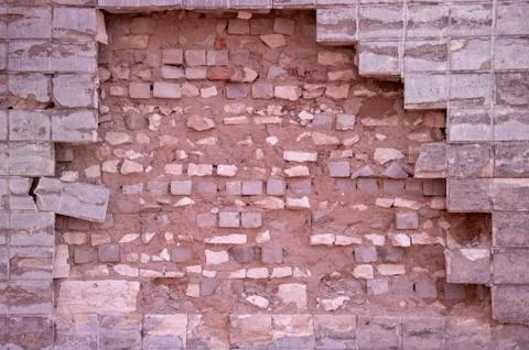 Fallen old brick wall. Stock Photos