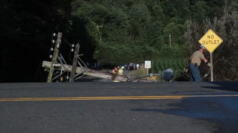 Fallen Power Pole with Workers on Scene Stock Footage 33775303