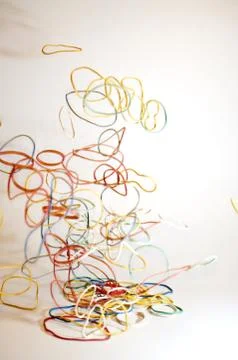 Fallende Gummiringe Stock Photos