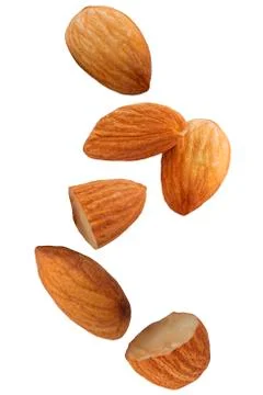 Falling almond nut isolated on white background Stock Photos