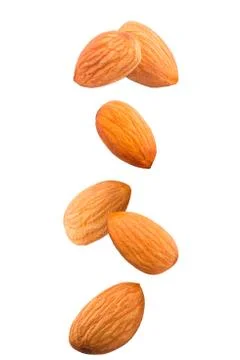 Falling almonds isolated on white Stock Photos