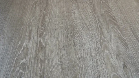 Falling and breaking an egg on laminate Stock Footage 77404941