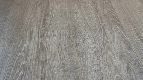 Falling and breaking an egg on laminate Stock Footage 77405700