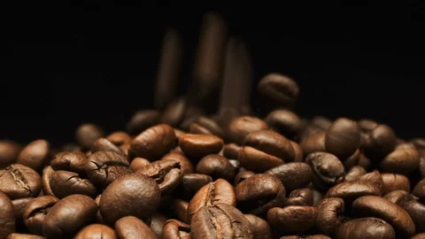 Falling And Rotates Coffee Beans. Close-up. Stock Footage 108803519