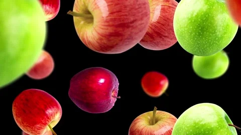 Falling apples black background.  LOOP  Stock Footage 253835164
