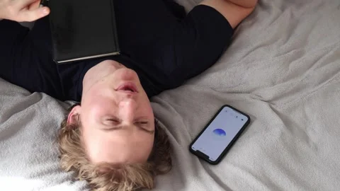Falling asleep with artificial intelligence as if drifting into dreams guided by Stock Footage 314979643