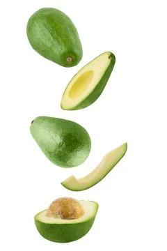 Falling avocado isolated on white background Stock Photos