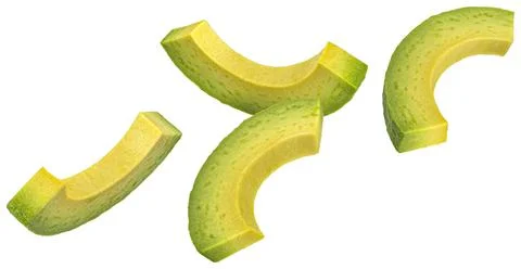 Falling avocado slices isolated on white background Stock Photos