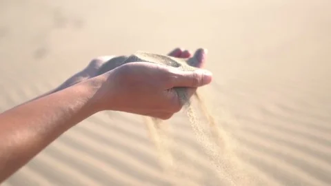 Falling beach sand from woman hands 스톡 동영상 80465853