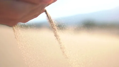 Falling beach sand from woman hands 스톡 동영상 80465859
