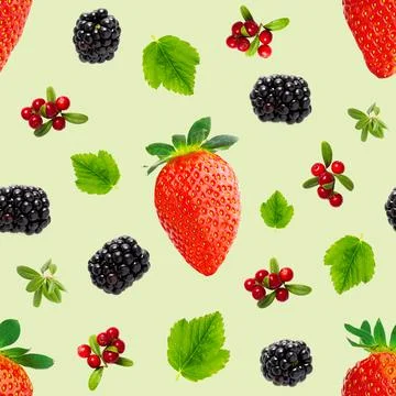 Falling berries seamless pattern isolated on green background, different flying Stock Photos