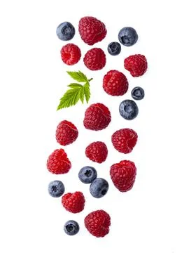 Falling  berry of raspberry and blueberries Stock Photos