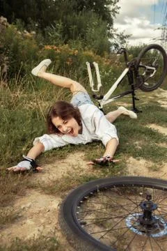 Falling from the bicycle Stock Photos