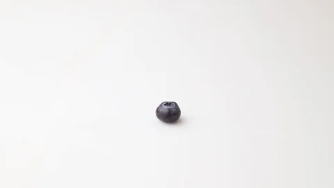 Falling blueberries isolated on white background. Side view. Stock Footage 127505689