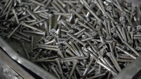 Falling Bolts In A Box With Bolts 動画素材 70341777