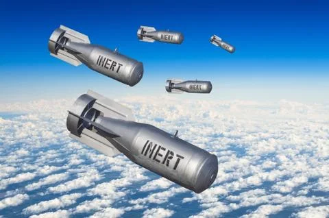 Falling bombs weapons charges dropped from a fighter combat aircraft high in  Fotos Stock