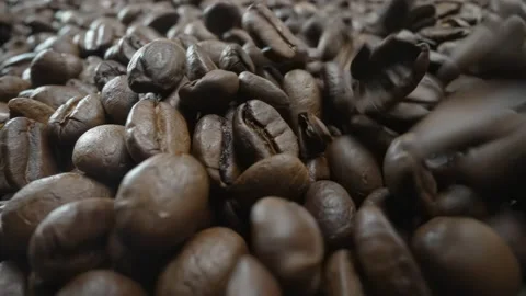 Falling, Bouncing and Colliding Coffee Beans Video stock 183325151