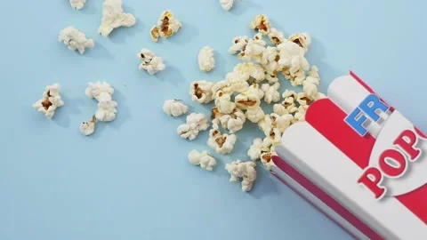 Falling box full of popcorn Stock Footage 237498087
