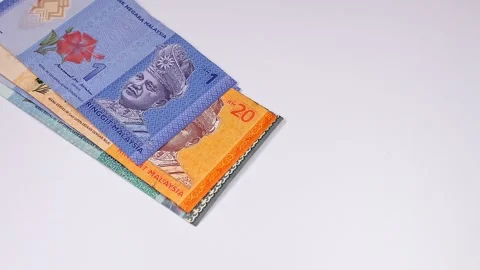 Falling brand new Malaysian ringgit (MYR) banknotes. Selective focus. Stock Footage 300027723