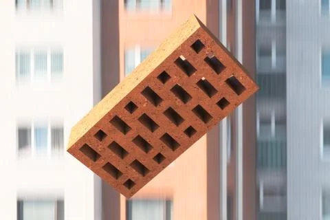 Falling brick. Motion blurred background. 스톡 사진