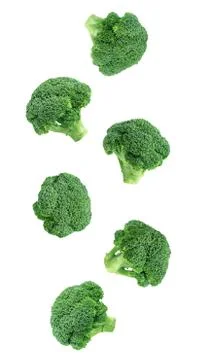 Falling broccoli isolated on a white background. Flying vegetables Stock Photos