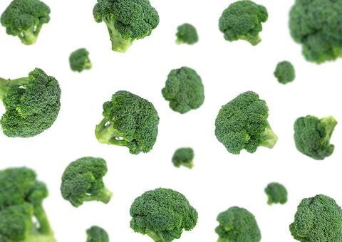 Falling broccoli isolated on a white background. Flying broccoli. Vegetable p Stockfoto's