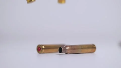 Falling Bullet Casings In Slow Motion - Symbol Of Hidden Political Violence Stock Footage 331949950