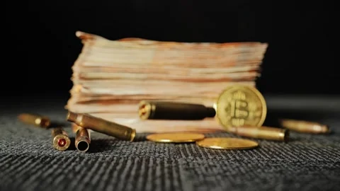 Falling Bullet Shell in Front of Money Stack Symbolizing Global Economic War Stock Footage 329538781