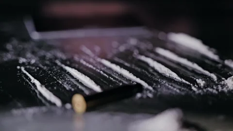 Falling Bullet Shells On White Powder Lines, Symbol Of Crime Chaos And Addiction Stock Footage 318948126