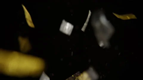 Falling Bunch Of Silver And Gold Confetti Stock Footage 233461365