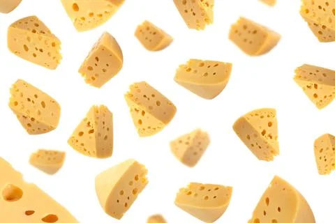 Falling cheese, isolated on white background, selective focus. Maasdam cheese Stock Photos