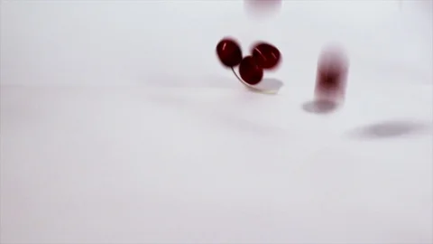 Falling cherries on a white background 库存影片 111375697