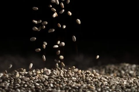 Falling chia seeds Stock Photos