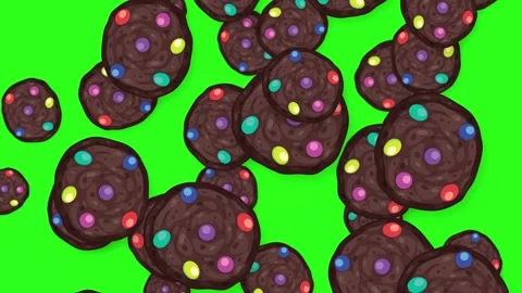 Falling Chocolate Cookies with Colorful Candy Toppings on Green Screen Stock Footage 345206746