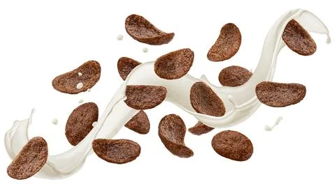 Falling chocolate corn flakes with milk splash isolated on white background Foto stock
