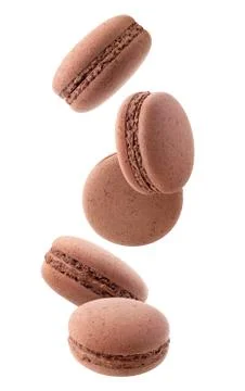 Falling chocolate macaroon isolated in the air Foto stock