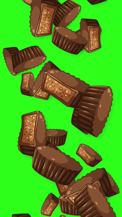 Falling Chocolate Peanut Butter Cups and Candy Bars on Green Screen Stock Footage 345297194