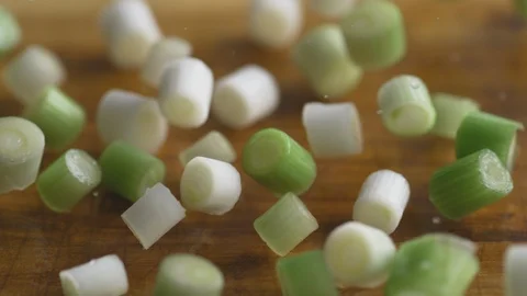 Falling chopped scallions. Slow Motion. Video stock 87240521