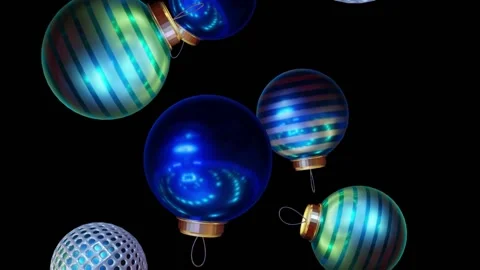Falling Christmas Baubles with black background Stock Footage