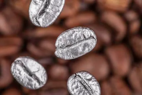 Falling coffee beans closeup Stockfoto's